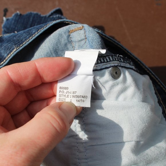 Calvin Klein Cut-Off Jean Shorts - Picture 7 of 10